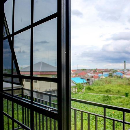 Oyo 90162 Remboelan Guest House Sungai Lutus Zewnętrze zdjęcie