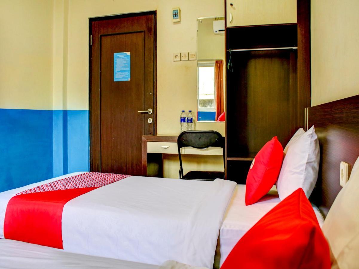 Oyo 90162 Remboelan Guest House Sungai Lutus Zewnętrze zdjęcie