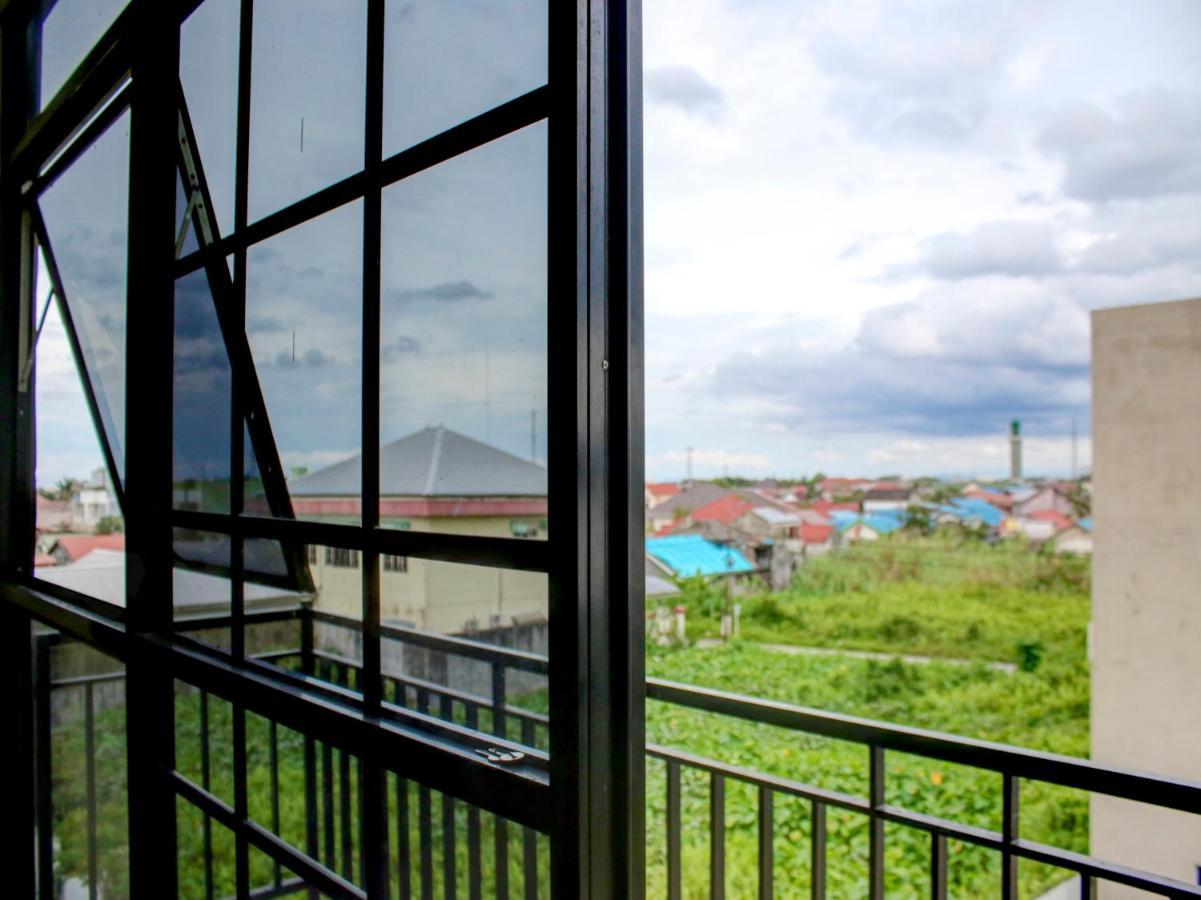 Oyo 90162 Remboelan Guest House Sungai Lutus Zewnętrze zdjęcie